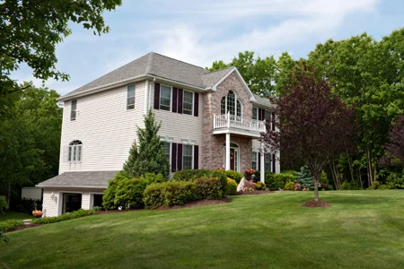 house with green lawn